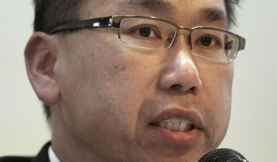 FILE - In this July 29, 2014 file photo, Cranston, R.I., Mayor Allan Fung responds to a question during a forum hosted by the Rhode Island Black Business Association, in Providence, R.I. Fung will face Ken Block in the Sept. 9 Republican gubernatorial primary. (AP Photo/Steven Senne, File)