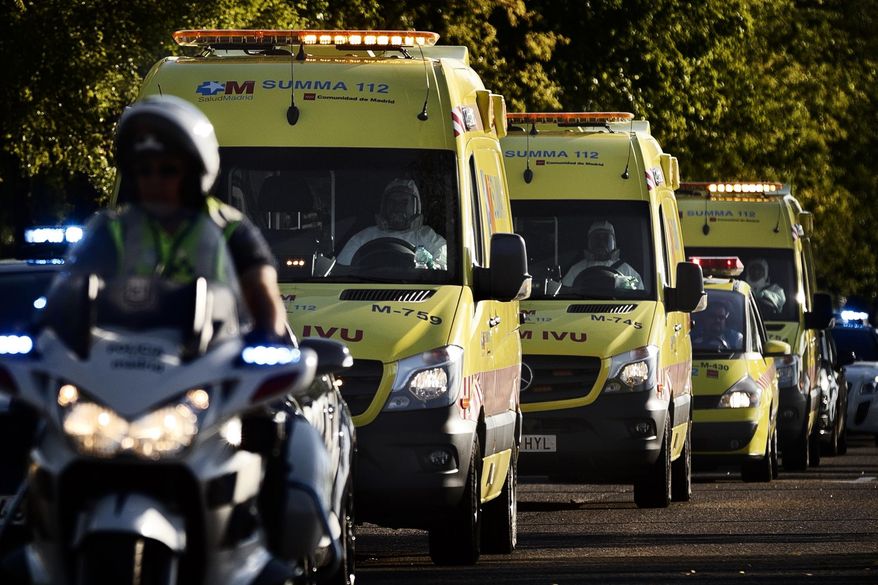 An ambulance transporting Miguel Pajares, a Spanish priest who was infected with the Ebola virus while working in Liberia, leaves the Military Air Base of Torrejon de Ardoz, near Madrid, Spain. Mr. Pajares, confirmed as the first Spaniard to be infected by the current outbreak of the ebola virus, is one of the 1,711 reported cases to have been confirmed since March, when the most deadly wave of the condition began. (AP Photo/Daniel Ochoa de Olza)