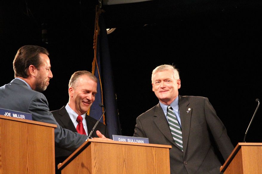 Alaska Republican U.S. Senate candidates Joe Miller left, Dan Sullivan, middle, and Mead Teadwell greet before a live televised debate Sunday, Aug. 10, 2014, in Anchorage, Alaska. Thousands of miles from the U.S-Mexico border, the major Republican candidates for U.S. Senate in Alaska clashed on immigration in a televised debate. (AP Photo/Mark Thiessen)
