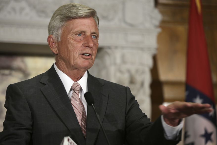 Arkansas Gov. Mike Beebe announces that the state Department of Education has partnered with EducationSuperHighway at the Arkansas state Capitol in Little Rock, Ark., Monday, Aug. 11, 2014. EducationSuperHighway is a nonprofit dedicated to improving Internet access in schools. (AP Photo/Danny Johnston)