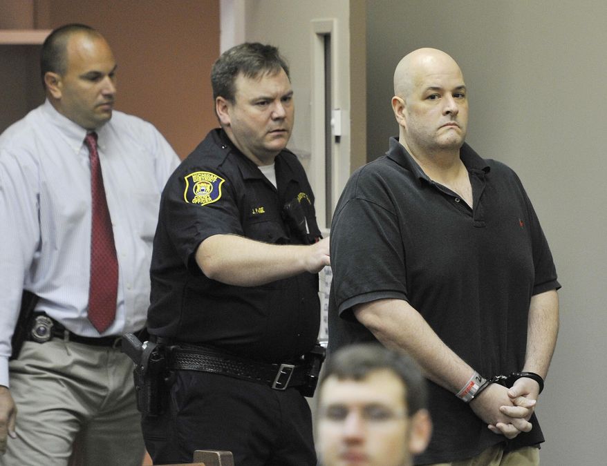 FILE- In an Aug. 20, 2012 file photo, Roger Bowling, right, is escorted into a courtroom by police and detectives for a preliminary examination at the 24th District Court in Allen Park, Mich. Jury selection is getting underway in the trial of Bowling is charged with killing a couple and dumping their body parts in the Detroit River. Bowling is charged in the deaths of 32-year-old Danielle Greenway and 42-year-old Chris Hall, who were killed in 2012 at their home in Allen Park. Trial is starting Monday, Aug. 11, 2014, with jury selection in Wayne County court. (AP Photo/The Detroit News, Daniel Mears_File)