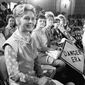 FILE - In this Aug. 10, 1976, file photo, women opposed to the Equal Rights Amendment sit with Phyllis Schlafly, left, national chairman of Stop ERA, at hearing of Republican platform subcommittee on human rights and responsibilities in a free society in Kansas City, Mo. One of the leading opponents of the ERA during the 1970s was conservative Illinois lawyer Phyllis Schlafly, who launched a campaign called Stop ERA and is credited with helping mobilize public opinion against the amendment in some of the states that balked at ratifying it. (AP Photo/File)