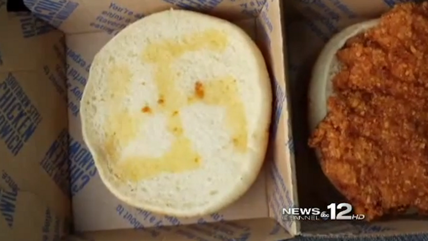 A McDonald's employee in Morehead City, North Carolina, has been fired after a woman found a swastika etched in butter on her chicken sandwich. (WCTI 12)