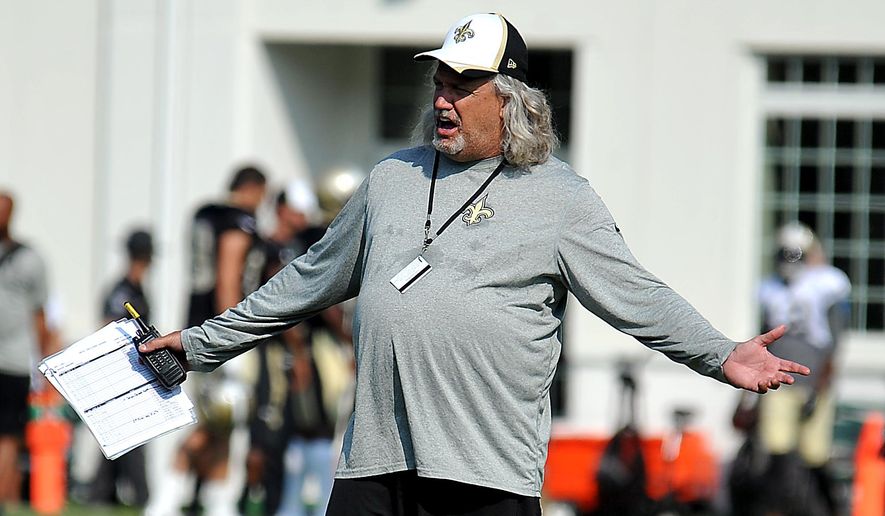 FILE - In this Aug. 5, 2014, file photo, New Orleans Saints defensive coordinator Rob Ryan gestures during the teams NFL football training camp in White Sulphur Springs, W.Va. One season after orchestrating a turnaround as the Saints&#39; defensive coordinator, Ryan has an upgraded roster. (AP Photo/Chris Tilley) ** FILE **