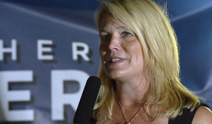 In this Tuesday, Aug. 12, 2014 photo, Heather Somers, a candidate for the Republican nomination for lieutenant governor, speaks to supporters in Groton, Conn., after a long wait for vote results on primary election day. Somers, a Groton Town Council member, was declared the winner of the three-way race on Wednesday. (AP Photo/The Day, Dana Jensen) MANDATORY CREDIT.