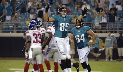 Jacksonville Jaguars tight end Matt Veldman (85) celebrates after catching a pass in the end zone for a two-point conversion during the second half of an NFL preseason football game against the New York Giants Friday, Aug. 10, 2012, in Jacksonville, Fla. (AP Photo/Phelan M. Ebenhack)