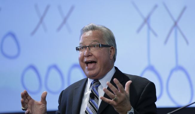 FILE - In this May 22, 2013, file photo, former Philadelphia Eagle, Philadelphia Soul owner, and ESPN analyst Ron Jaworski speaks during an event discussing impact of sports, hosted by the Rothman Institute, in Philadelphia. The China American Football League plans to kick off in the world&#x27;s most populous country in 2015. The announcement made Thursday, Aug. 14, 2014, comes less than a year after Philadelphia Soul co-owner Marty Judge sponsored the first American football game played in China. Former Super Bowl-winning coach Dick Vermeil and former Pro Bowl quarterback Ron Jaworski partnered with Judge to help make it happen.  (AP Photo/Matt Rourke, File)