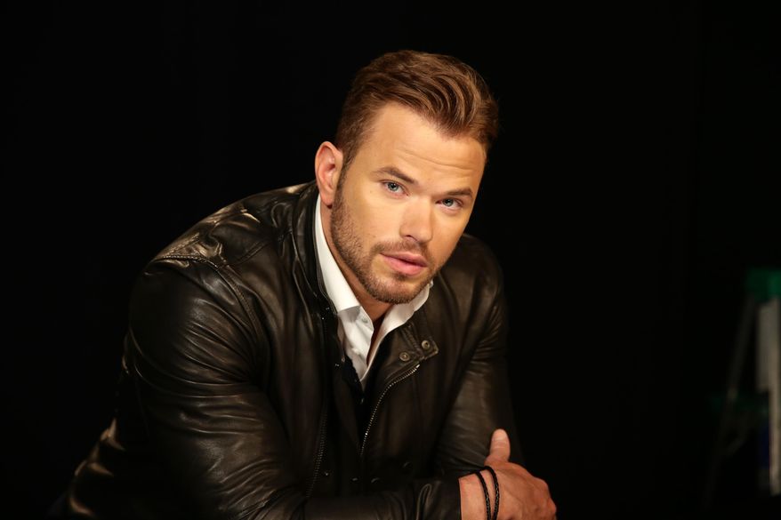 Actor Kellan Lutz poses for a portrait in New York on Thursday, Aug. 14, 2014. Lutz stars in the action film, "Expendables 3," opening Friday. (AP Photo/John Carucci)