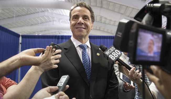** FILE ** In this Aug. 9, 2014, file photo, New York Gov. Andrew Cuomo speaks to the media following a news conference and bill signing that authorizes New York City to lower their speed limit in New York. (AP Photo/John Minchillo, File)