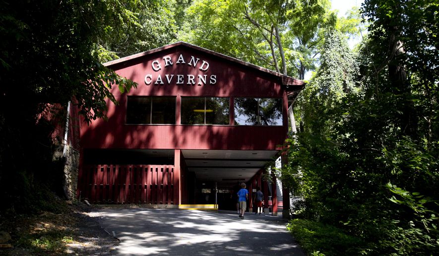 FOR RELEASE SUNDAY, AUGUST 17, 2014, AT 9:00 A.M. EDT - In this Aug. 4, 2014 photo, visitors enter the building which houses the long path that leads to the entrance of Grand Caverns in Grottoes, Va From the Shenandoah Valley to the Cumberland Gap, from Luray Caverns to Dixie Caverns, these "show caves" all have their own distinct features that set them apart from one another. (AP Photo/The Roanoke Times, Stephanie Klein-Davis) LOCAL TELEVISION OUT; SALEM TIMES REGISTER OUT; FINCASTLE HERALD OUT; CHRISTIANBURG NEWS MESSENGER OUT; RADFORD NEWS JOURNAL OUT; ROANOKE STAR SENTINEL OUT