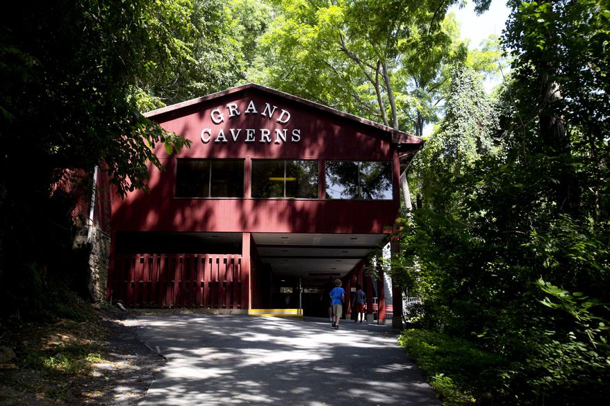 FOR RELEASE SUNDAY, AUGUST 17, 2014, AT 9:00 A.M. EDT - In this Aug. 4, 2014 photo, visitors enter the building which houses the long path that leads to the entrance of Grand Caverns in Grottoes, Va From the Shenandoah Valley to the Cumberland Gap, from Luray Caverns to Dixie Caverns, these "show caves" all have their own distinct features that set them apart from one another. (AP Photo/The Roanoke Times, Stephanie Klein-Davis) LOCAL TELEVISION OUT; SALEM TIMES REGISTER OUT; FINCASTLE HERALD OUT; CHRISTIANBURG NEWS MESSENGER OUT; RADFORD NEWS JOURNAL OUT; ROANOKE STAR SENTINEL OUT