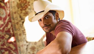 Country music singer Brad Paisley has been driving the buzz about his forthcoming album &quot;Moonshine in the Trunk,&quot; with &#39;leaks&#39; on social media.