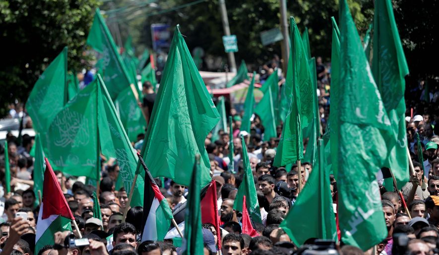 Hamas supporters gather for a rally in Gaza City, Gaza Strip. Evidence has pointed to Iran continuing to funnel weapons to the Palestinian side of the conflict with Israel. (Associated Press)