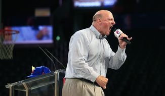 New Los Angeles Clippers owner Steve Ballmer, center, fires up the crowd as he speaks at the Clippers Fan Festival on Monday, Aug. 18, 2014, in Los Angeles. (AP Photo/Jae C. Hong)