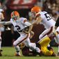 Cleveland Browns quarterback Johnny Manziel (2) is sacked by Washington Redskins outside linebacker Ryan Kerrigan (91) in the first quarter at FedEx Field, Aug. 18, 2014. (Preston Keres/Special for The Washington Times)