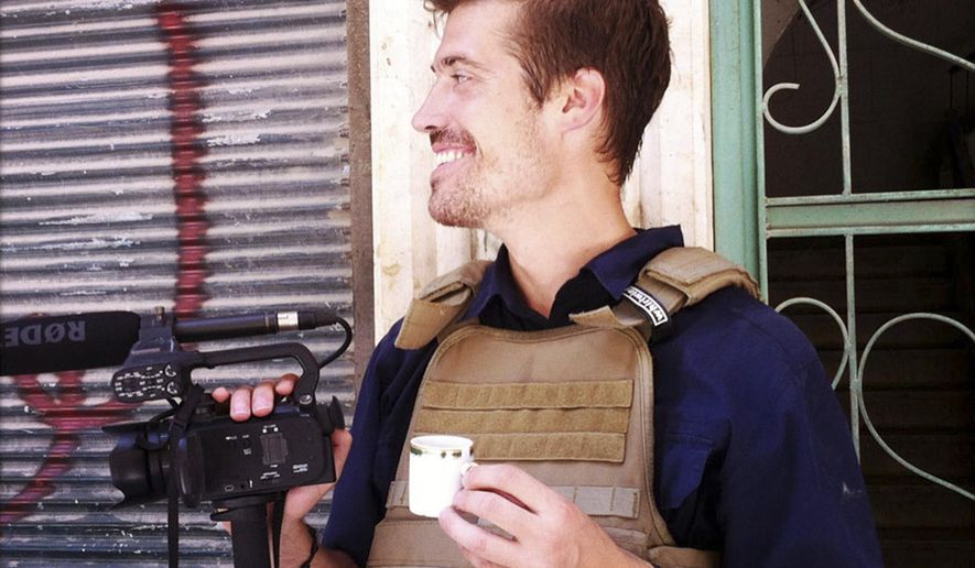 FILE - This file photo posted on the website freejamesfoley.org shows journalist James Foley in Aleppo, Syria, in July, 2012.In a horrifying act of revenge for U.S. airstrikes in northern Iraq, militants with the Islamic State extremist group have beheaded Foley — and are threatening to kill another hostage, U.S. officials say. (AP Photo/freejamesfoley.org, Nicole Tung, File) NO SALES
