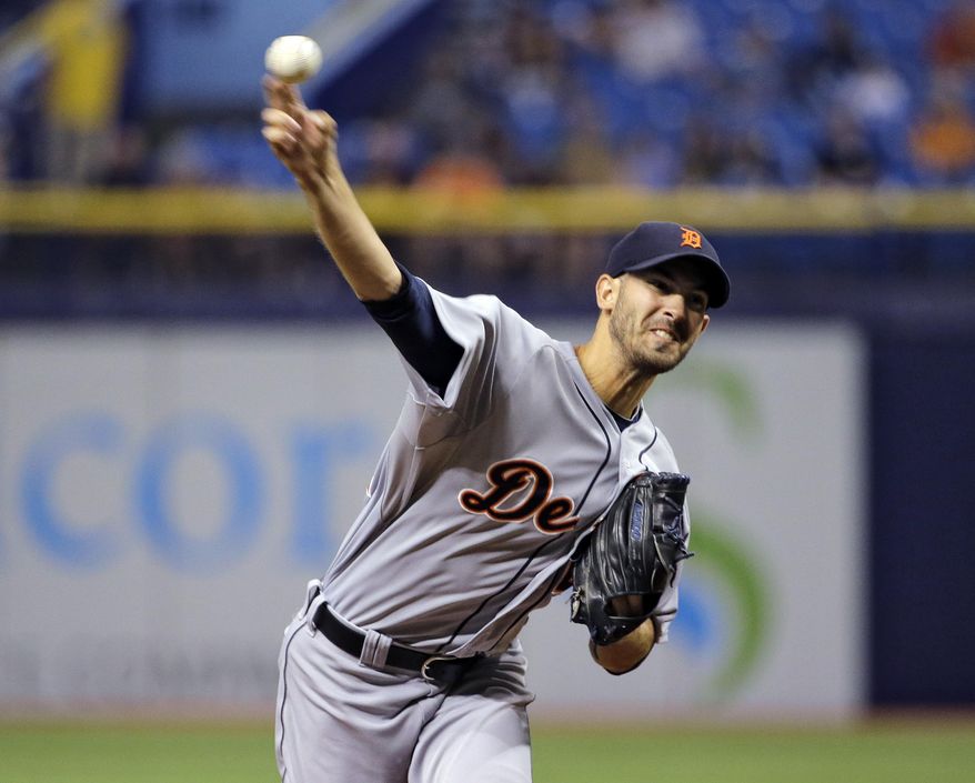 Detroit Tigers starting pitcher Rick Porcello delivers to the Tampa Bay Rays during the first inning of a baseball game Wednesday, Aug. 20, 2014, in St. Petersburg, Fla. (AP Photo/Chris O'Meara)