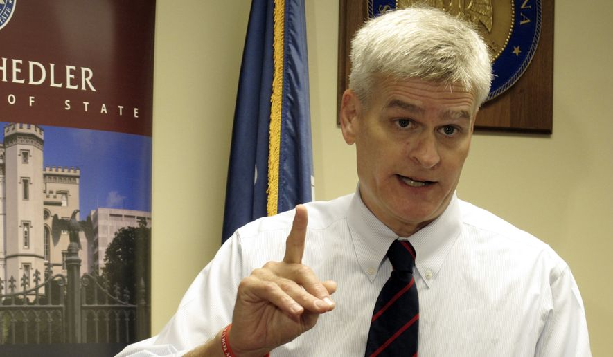 U.S. Rep. Bill Cassidy, a Republican, speaks to reporters after qualifying to run for the U.S. Senate, Wednesday, Aug. 20, 2014, in Baton Rouge, La. Cassidy is seeking to keep Democratic Sen. Mary Landrieu from a fourth term in office. (AP Photo/Melinda Deslatte) ** FILE ** 