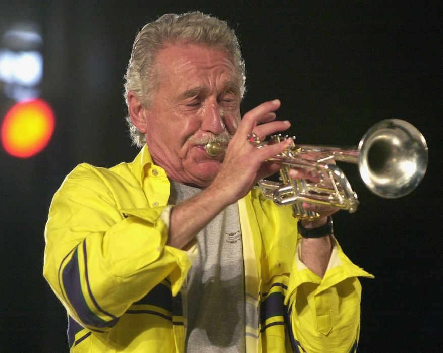 FILE - This Oct. 9, 2001 file photo, shows Doc Severinsen practicing for a performance in Hattiesburg, Miss. Severinsen is among three people being inducted into the Scandinavian-American Hall of Fame in Minot, N.D., in 2014. The Grammy Award-winning Severinsen was leader of The Tonight Show Band for 30 years, during the heyday of Johnny Carson and Ed McMahon. (AP Photo/Hattiesburg American, George Clark, File)