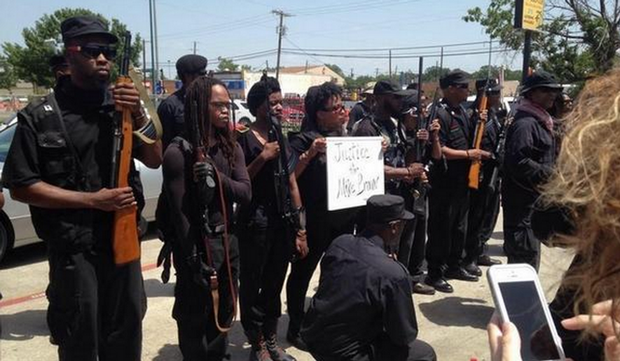 Black gun-rights activists in Texas protested police brutality on Wednesday by exercising their rights to openly carry firearms through the streets of South Dallas. (Twitter/@HueyGunClub)