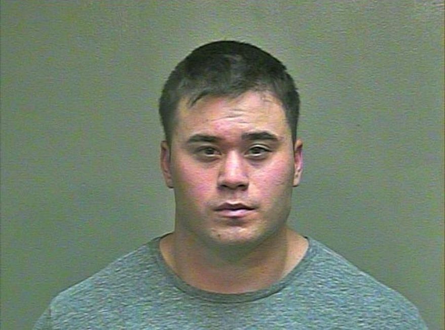 This Aug. 21, 2014 photo made available by the Oklahoma County Sheriff's Office shows Daniel K. Holtzclaw. The 27-year-old Oklahoma City police officer was arrested Thursday, Aug. 21, 2014 and is being held in lieu of $5 million bond after being accused of committing a series of sexual assaults against at least six women while on duty. (AP Photo/Oklahoma County Sheriff's Office)