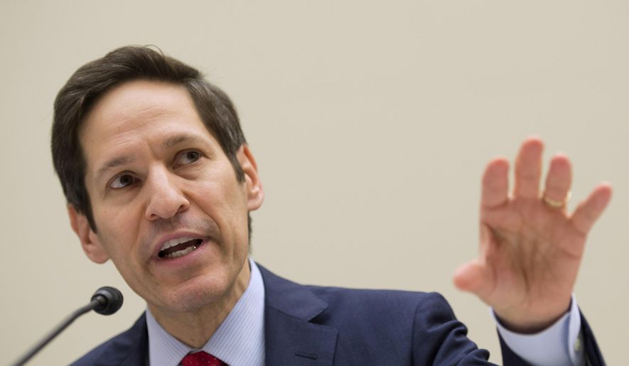 FILE - In this Aug. 7, 2014 file photo, Centers for Disease Control and Prevention (CDC) Director Dr. Tom Frieden testifies on Capitol Hill in Washington before the House subcommittee on Africa, Global Health, Global Human Rights, and International Organizations hearing on "Combating the Ebola Threat." A CDC spokesman said Friday, Aug. 22, 2014, that Frieden wants to meet the African and international health leaders trying to control the outbreak, and to hear what help they need. (AP Photo/Molly Riley, File)