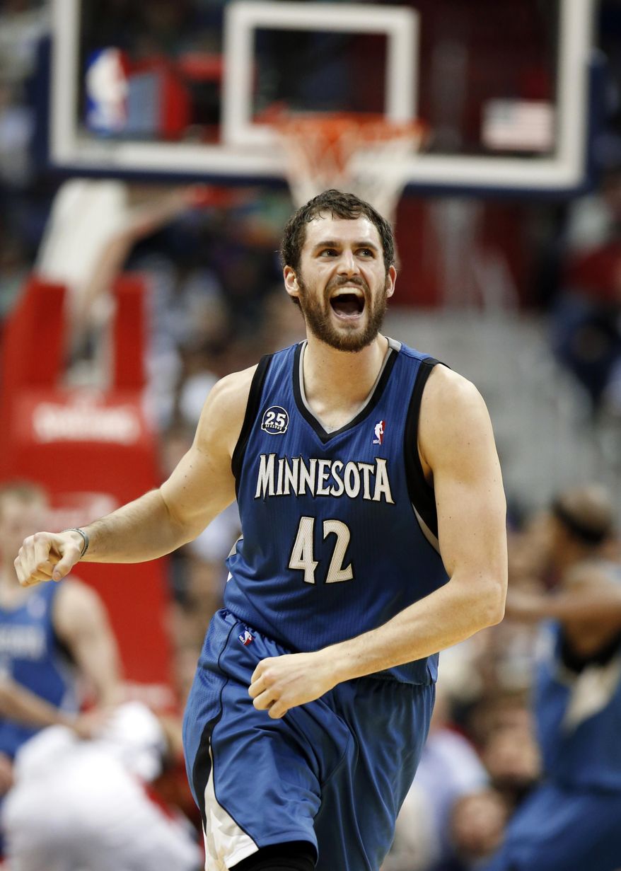 ** FILE ** Minnesota Timberwolves forward Kevin Love (42) reacts in the second half of an NBA basketball game against the Washington Wizards in Washington,  Nov. 19, 2013. (Associated Press)