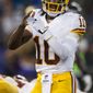 Washington Redskins&#39; quarterback Robert Griffin III calls a timeout during the first quarter against the Baltimore Ravens during the first quarter of their pre-season game at M&amp;T Bank Stadium on August 23, 2014 in Baltimore, Maryland. (Pete Marovich Special to The Washington Times)