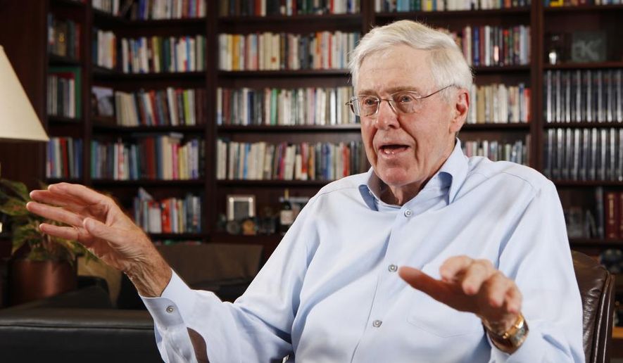 This photo taken May 22, 2012, shows Charles Koch in his office at Koch Industries in Wichita, Kansas, where Koch Industries manages 60,000 employees in 60 countries. (AP Photo/The Wichita Eagle, Bo Rader)