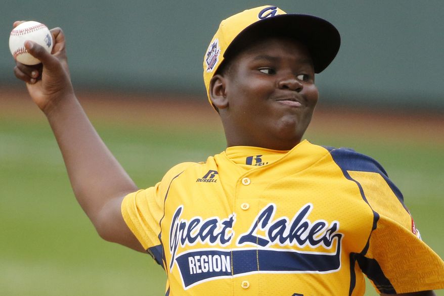 Chicago&#39;s Joshua Houston delivers in the first inning of a United States Championship game against Las Vegas at the Little League World Series tournament in South Williamsport, Pa., Saturday, Aug. 23, 2014. (AP Photo/Gene J. Puskar)