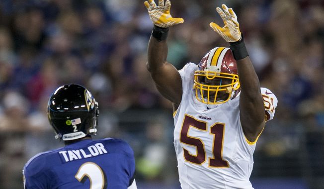 Washington Redskins&#x27; linebacker Everette Brown defends against a Baltimore Ravens&#x27; Tyrod Taylor pass during the first quarter of their pre-season game at M&amp;T Bank Stadium on August 23, 2014 in Baltimore, Maryland. Baltimore won the game 23-17. (Pete Marovich Special to The Washington Times)