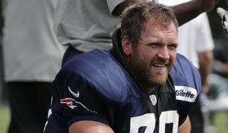 New England Patriots guard Logan Mankins (70) during an NFL Football training camp scrimmage of New England Patriots and Philadelphia Eagles in Foxborough, Mass., Tuesday, Aug. 12, 2014. (AP Photo/Charles Krupa)