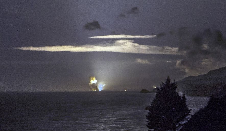 This Monday, Aug. 25, 2014, photo provided by Scott Wight shows the horizon from Cape Greville in Chiniak, Alaska, after a rocket carrying an experimental Army strike weapon exploded after taking off from a launch pad in Alaska. (AP Photo/Scott Wight) ** FILE **