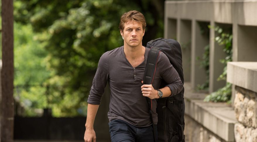 This image released by Relativity Media shows Luke Bracey in a scene from the film, "The November Man." (AP Photo/Relativity Media, Aleksandar Letic)