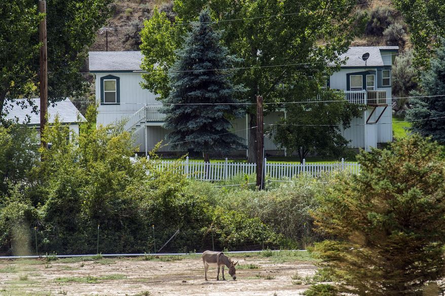 This Wednesday, Aug. 20, 2014 photo shows the home outside of Pocatello, Idaho where authorities pulled out nine boys who were sent there for repentance missions by Warren Jeffs. On Thursday, Aug. 28, 2014, Nathan C. Jessop, a polygamous man who oversaw the home, pleaded guilty to three counts of child abuse. The boys were removed in July 2014 after the alleged abuse was reported by a boy who escaped. Jeffs is in a Texas prison, where he is a serving a life sentence for sexually assaulting underage girls he considered brides. (AP Photo/The Salt Lake Tribune, Chris Detrick)