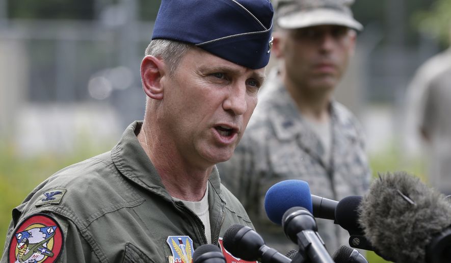 U.S. Air National Guard Col. James Keefe, commander of the 104th Fighter Wing, said at a news conference Wednesday that there were no munitions onboard the jet that crashed Wednesday into a mountain in Virginia.  The plane was flying at about 30,000 to 40,000 feet when the pilot reported the emergency.  (AP Photo/Steven Senne)
