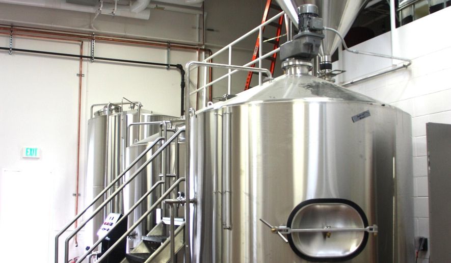 State-of-the-art brewing equipment is shown Aug. 22, 2014 ready to begin producing keg and bottled beer for Bell’s Brewery’s new Upper Hand Brewery in Escanaba, Mich. (AP Photo/The Mining Journal, Jenny Lancour)