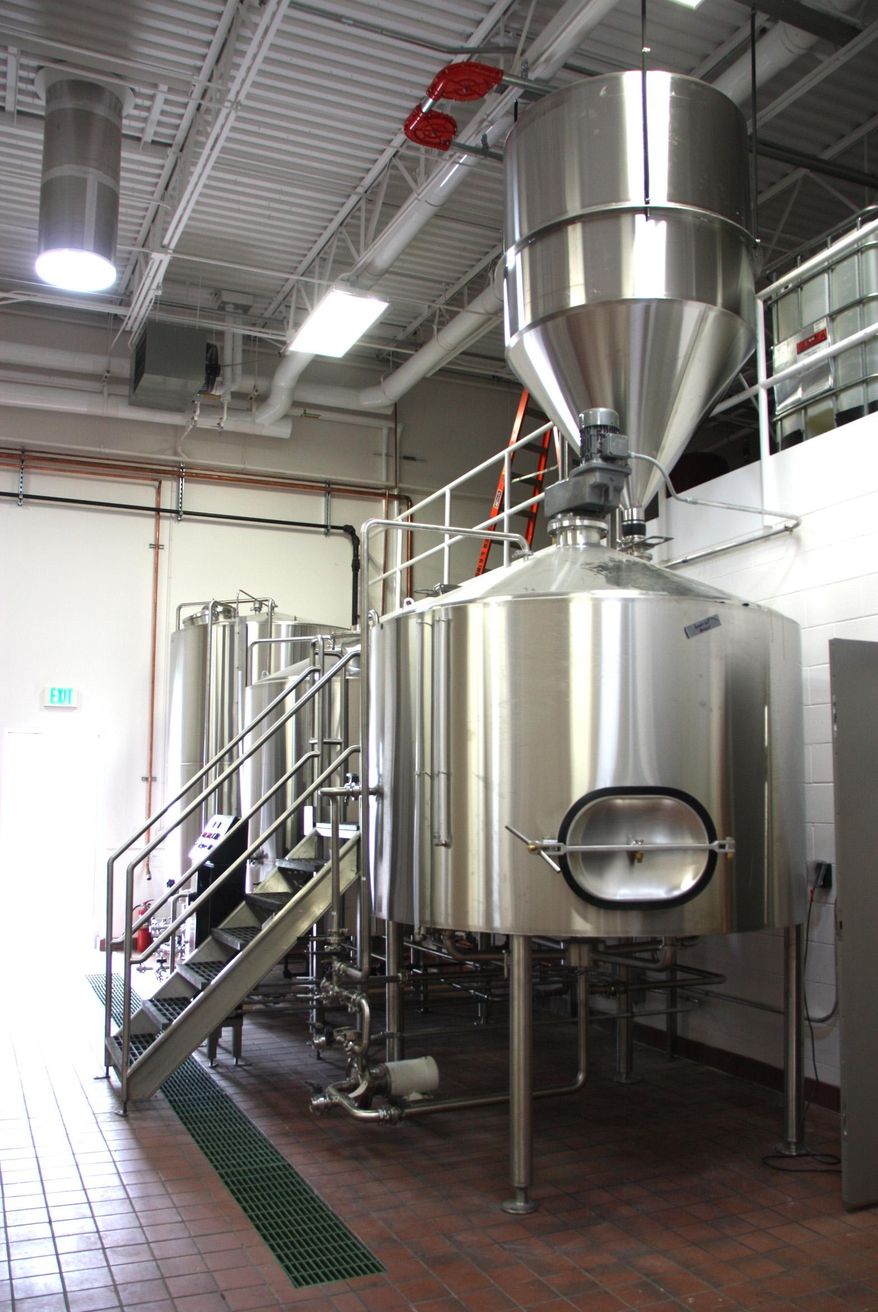 State-of-the-art brewing equipment is shown Aug. 22, 2014 ready to begin producing keg and bottled beer for Bell’s Brewery’s new Upper Hand Brewery in Escanaba, Mich. (AP Photo/The Mining Journal, Jenny Lancour)