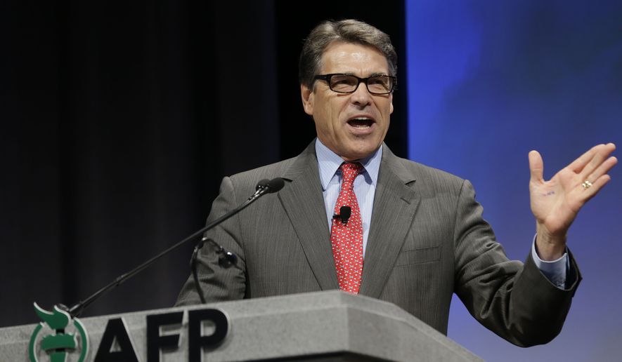 Texas Gov. Rick Perry speaks at the Americans for Prosperity gathering Friday, Aug. 29, 2014, in Dallas. Perry and Kentucky Sen. Rand Paul are bashing what they call the president&#39;s lack of leadership in response to the violent militant group attacking cities in Iraq. Both are among four top Republicans considering 2016 White House bids addressing the conservative summit in Dallas. (AP Photo/LM Otero)  