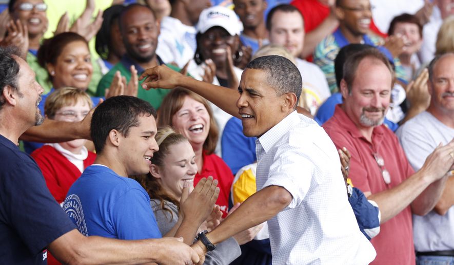 FILE - In this Sept. 6, 2010 file photo, President Barack Obama greets supporters before speaking on the economy at the Milwaukee Laborfest in Henry Maier Festival Park in Milwaukee. The last time President Barack Obama came to Wisconsin to celebrate workers' rights on Labor Day, there was barely a hint of the turmoil that was to come just months later as public employees fought unsuccessfully to retain their ability to collectively bargain. Now, four years later, as the architect of the law that stripped unions of that power faces re-election, Obama is coming back to Milwaukee for an event also featuring Gov. Scott Walker's Democratic challenger Mary Burke. (AP Photo/Pablo Martinez Monsivais)