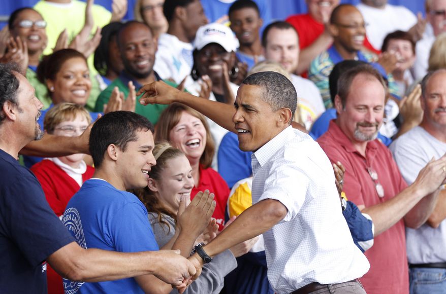 FILE - In this Sept. 6, 2010 file photo, President Barack Obama greets supporters before speaking on the economy at the Milwaukee Laborfest in Henry Maier Festival Park in Milwaukee. The last time President Barack Obama came to Wisconsin to celebrate workers' rights on Labor Day, there was barely a hint of the turmoil that was to come just months later as public employees fought unsuccessfully to retain their ability to collectively bargain. Now, four years later, as the architect of the law that stripped unions of that power faces re-election, Obama is coming back to Milwaukee for an event also featuring Gov. Scott Walker's Democratic challenger Mary Burke. (AP Photo/Pablo Martinez Monsivais)