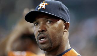 FILE - In this June 10, 2014, file photo, Houston Astros manager Bo Porter watches the action during the seventh inning of a baseball game against the Arizona Diamondbacks in Phoenix. The Astros have fired manager Bo Porter in his second season with the club. General manager Jeff Luhnow says the decision wasn&#x27;t based on Houston&#x27;s record but because &quot;we need a new direction in our clubhouse.&quot; The Astros entered Monday, Sept. 1, 2014, in fourth place in the AL West with a 59-79 record, second worst in the league.  (AP Photo/Ross D. Franklin, File)