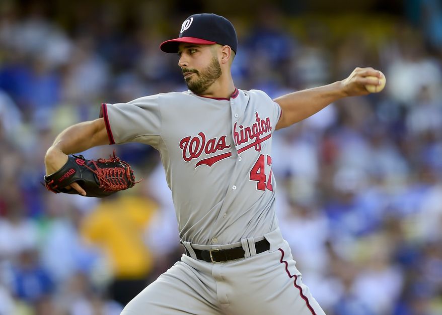 Washington Nationals Gio Gonzalez pitches in the first inning of a baseball game against the Los Angeles Dodgers, Monday, Sept. 1, 2014, in Los Angeles. (AP Photo/Gus Ruelas)