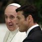 Pope Francis talks to former Argentine defender Javier Zanetti in the Paul VI hall at the Vatican, Monday, Sept. 1, 2014 ahead of an inter-religious match for peace. The friendly soccer match, supported by Pope Francis to promote the dialogue and peace among different religions, is scheduled at Rome&#39;s Olympic stadium later Monday. (AP Photo/Gregorio Borgia)