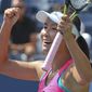 Peng Shuai, of China, reacts after defeating Belinda Bencic, of Switzerland, during the quarterfinals of the 2014 U.S. Open tennis tournament, Tuesday, Sept. 2, 2014, in New York. (AP Photo/Mike Groll)