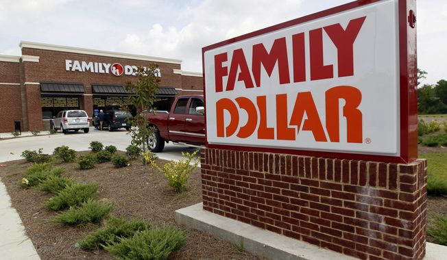 Family Dollar and other cost-cutter stores are seeing record business as wages remain flat. (AP Photo/Rogelio V. Solis, File) — FILE 