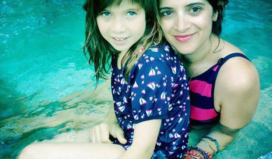 Melissa Sarkis-Kirby, seen with her daughter Colette, suffered a brain stem stroke in April. She is in rehab in Towson, Maryland. (Family photograph)