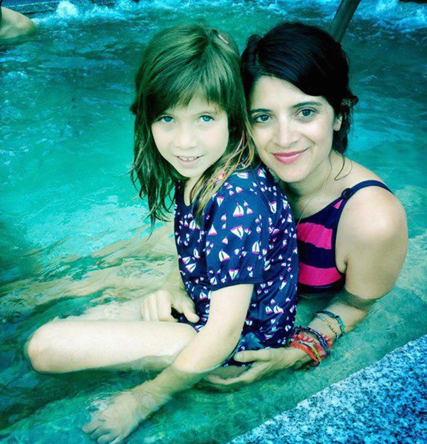 Melissa Sarkis-Kirby, seen with her daughter Colette, suffered a brain stem stroke in April. She is in rehab in Towson, Maryland. (Family photograph)