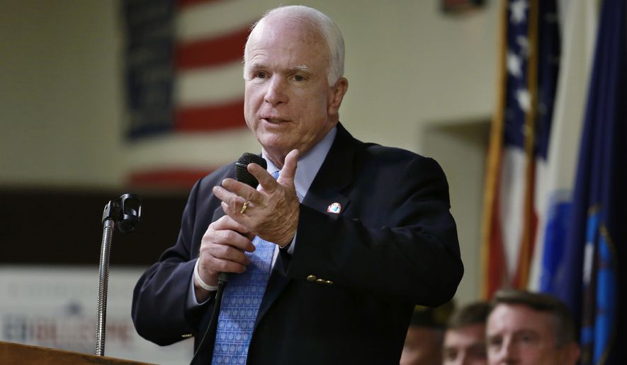 U.S. Sen. John McCain campaigns for GOP senate candidate Ed Gillespie, right, at VFW Post 4809 in Norfolk, Va. on Wednesday, Sept. 3, 2014. (AP Photo/The Virginian-Pilot, Stephen M. Katz)