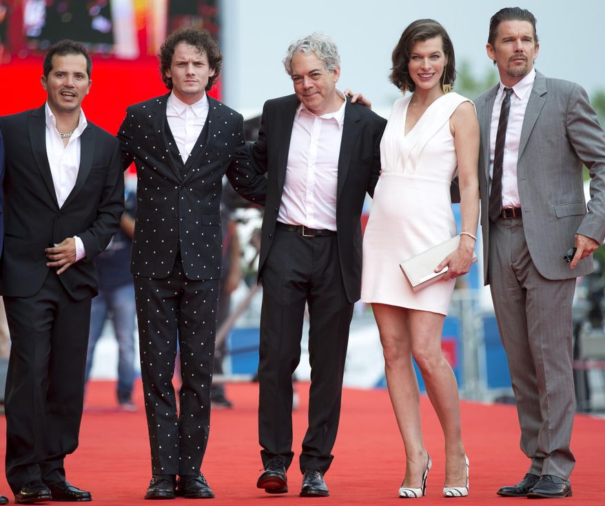 From right, actor Ethan Hawk, actress Milla Jovovich, director Michael Almereyda, actor Anton Yelchin and actor John Leguizamo pose for photographers as they arrive for the screening of Cymbeline at the 71st edition of the Venice Film Festival in Venice, Italy, Wednesday, Sept. 3, 2014. (AP Photo/Andrew Medichini)